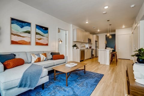 a living room with a couch and a table